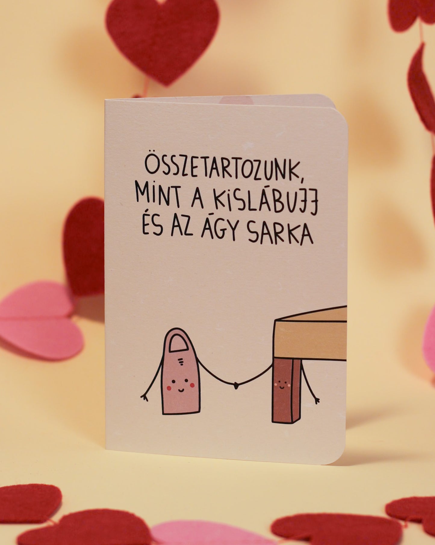 mint a kislábujj és az ágy sarka képeslap